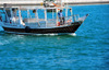 Doha, Qatar: water taxi leaving for the Corniche - Dhow harbour - photo by M.Torres