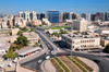 Doha, Qatar: view along Jabr Bin Mohd St, round-about at Ras Abu Abboud St - Qatar National Libary, Doha Stadium - photo by M.Torres