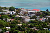 Port Mathurin, Rodrigues island, Mauritius: the island's capital, located by the ocean and alternating buildings with trees - photo by M.Torres