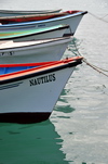 Port Mathurin, Rodrigues island, Mauritius: prows of small boats - photo by M.Torres