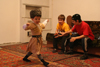 Chechnya, Russia - a boy wearing Chechen national costume and dancing traditional Chechen dance - photo by A.Bley