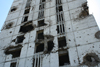 Chechnya, Russia - Grozny - destroyed building - war scars - artillery impacts - photo by A.Bley