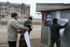 Chechnya, Russia - Grozny - placing election posters with president Ramzan Kadyrov - photo by A.Bley