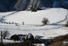 Chechnya, Russia - landscape in winter with snow and mountains - farm house and haystacks - photo by A.Bley