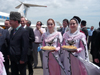 Chechnya, Russia - Grozny - two Chechen women welcomes the guests in airport dressed in national Chechen costume - photo by A.Bley
