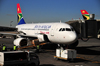 Johannesburg, Gauteng, South Africa: South African Airways Airbus A319-131, ZS-SFG, cn 2326, boarding cargo at OR Tambo International / Johannesburg International Airport / Jan Smuts / JNB - Kempton Park, Ekurhuleni - photo by M.Torres