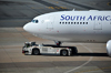 Johannesburg, Gauteng, South Africa: South African Airways Airbus A330-243 ZS-SXX (ex F-WWYL), cn 1223 with Goldhofer AST-1 Towbarless Tug operated by Swissport - OR Tambo International / Johannesburg International Airport / Jan Smuts / JNB - Kempton Park, Ekurhuleni - photo by M.Torres