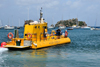 Gustavia, St. Barts / Saint-Barthlemy: the Yellow Submarine sets sail to the Marine Park of Saint Barth - semi-submersible tour ship - Les Gros Islets in the background - photo by M.Torres