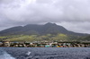Brumaire / Basseterre, Saint Kitts island, Saint Kitts and Nevis: the waterfront seen from the bay - mountains in the background - photo by M.Torres