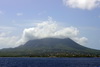 Nevis island, St Kitts and Nevis: seen from the sea, Nevis Peak volcano with orographic clouds - West coast - photo by M.Torres
