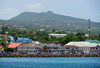 Charlestown, Nevis, St Kitts and Nevis: downtown of the island's capital seen from the sea - once a major centre for Britains sugar growers and slave traders, now a tax haven - photo by M.Torres