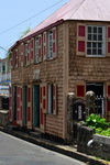 Charlestown, Nevis, St Kitts and Nevis: Creole architecture - building with zinc roof and shingles on the facade - Government Road - photo by M.Torres