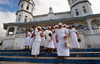 Samoa - Sava'i: Sunday morning church-goers on the church steps - photo by R.Eime
