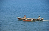 Neves, Lemb district, So Tom and Prncipe / STP: fishermen in an outrigger / pescadores num mini-catamaran - photo by M.Torres