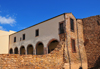 Iglesias / Igrsias, Carbonia-Iglesias province, Sardinia / Sardegna / Sardigna: Saint Francis Cloister near a medieval tower - Chiostro San Francesco - photo by M.Torres