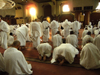 Mecca / Makkah, Saudi Arabia: group of hajj pilgrims prays in Tanae'im mosque, about 5 km from Haram Mosque - Ihram clothing - Tanae'im Mosque is the nearest halal area before the start of Umra, the smaller pilgrimage - photo by A.Faizal