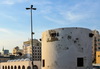 Jeddah, Mecca Region, Saudi Arabia: old tower, Bab Sharif market, Banajah road, Al-Balad historic district - part of the old Jeddah city wall - Unesco world heritage - photo by M.Torres