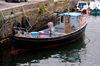 Scotland - Islay Island - Port Ellen: a small fishing vessel tied up in the harbour - photo by C.McEachern