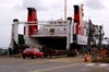 Scotland - isle of Islay - Port Ellen: the Calmac Ferry, stern to the wall, prepares to take on car and truck cargo - photo by C.McEachern
