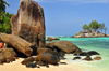 Mahe, Seychelles: Anse Royal - ile Souris and large rocks - photo by M.Torres