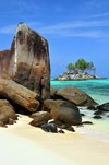 Mahe, Seychelles: Anse Royal - ile Souris, beach and natural menhir - photo by M.Torres