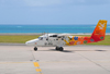 Mahe, Seychelles: Air Seychelles De Havilland Canada DHC-6-300 Twin Otter S7-AAJ (cn 499) Isle of Desroches with hibiscus flowers livery - Seychelles International Airport - SEZ - photo by M.Torres