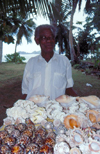 Seychelles - Mahe island: Anse Takamaka - conch seller - photo by F.Rigaud