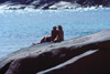 Seychelles - Mahe island: Anse Takamaka - couple on the rocks - photo by F.Rigaud
