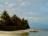 Turtle Islands, Southern Province, Sierra Leone: unspoilt beach and canoe - photo by T.Trenchard