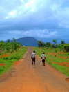 Freetown Peninsula, Sierra Leone: children returning from school along an empty road - photo by T.Trenchard