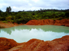 Kono district,  Eastern Province, Sierra Leone: diamond mine - pond on a crater - photo by T.Trenchard