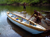 Guma River, Western Area National Park, Freetown Peninsula, Sierra Leone: small wooden boat on the river - photo by T.Trenchard
