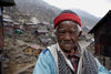 Sikkim: yak a man and his village - mountain dweller - photo by G.Koelman