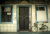 Singapore: old shop house - bike (photo by S.Lovegrove / Picture Tasmania)