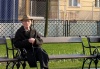 Slovakia / Slowakei - Bratislava: old man on a bench - photo by J.Kaman