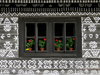 Slovakia - Cicmany village: folk architecture reserve - window with flower pots - Zilina district - photo by J.Kaman