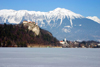 Slovenia - View across Lake Bled when frozen over in winter towards the Karavanke mountain range - Julian Alps - photo by I.Middleton