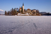 Slovenia - frozen lake Bled and the island church of the Assumption of Mary - Cerkev Marijinega vnebovzetja - photo by I.Middleton