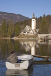 Slovenia - Ribcev Laz - boat and church - Bohinj Lake in Spring - photo by I.Middleton