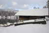 Slovenia - Ribcev Laz - bungalow and view across Bohinj Lake in winter - photo by I.Middleton