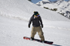 Slovenia - Snowboarder on Vogel mountain in Bohinj - gaining speed - photo by I.Middleton