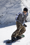Slovenia - Snowboarder on Vogel mountain in Bohinj - camouflage - photo by I.Middleton