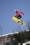 Slovenia - Snowboarder on Vogel mountain in Bohinj - jump with lemon board - photo by I.Middleton