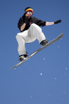 Slovenia - Snowboarder on Vogel mountain in Bohinj - flying and posing - photo by I.Middleton