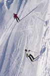 Slovenia - skiers speed down Vogel mountain in Bohinj - photo by I.Middleton