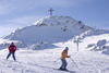 Slovenia - hill with cross and people skiing on Vogel mountain in Bohinj - photo by I.Middleton