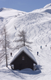 Slovenia - Mountain Hut and people skiing on Vogel mountain in Bohinj - photo by I.Middleton