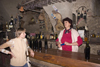 Slovenia - Bizeljsko: Owner behind bar in Oresje Castle vinoteka - photo by I.Middleton