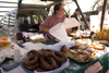 Slovenia - Jance: sausages - woman selling local produce at the Chestnut Sunday festival - photo by I.Middleton