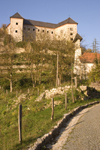 Slovenia - Kostel - road and Kostel castle - photo by I.Middleton